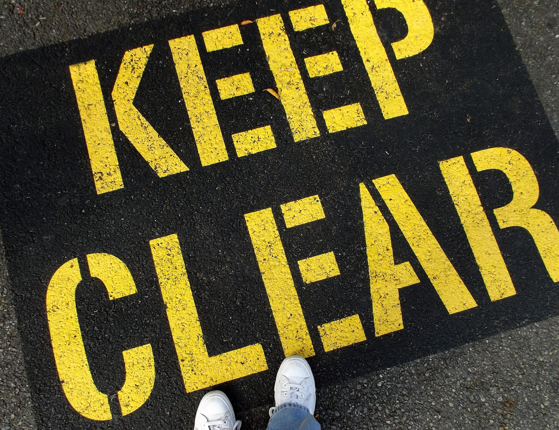 Keep Clear sign on the ground