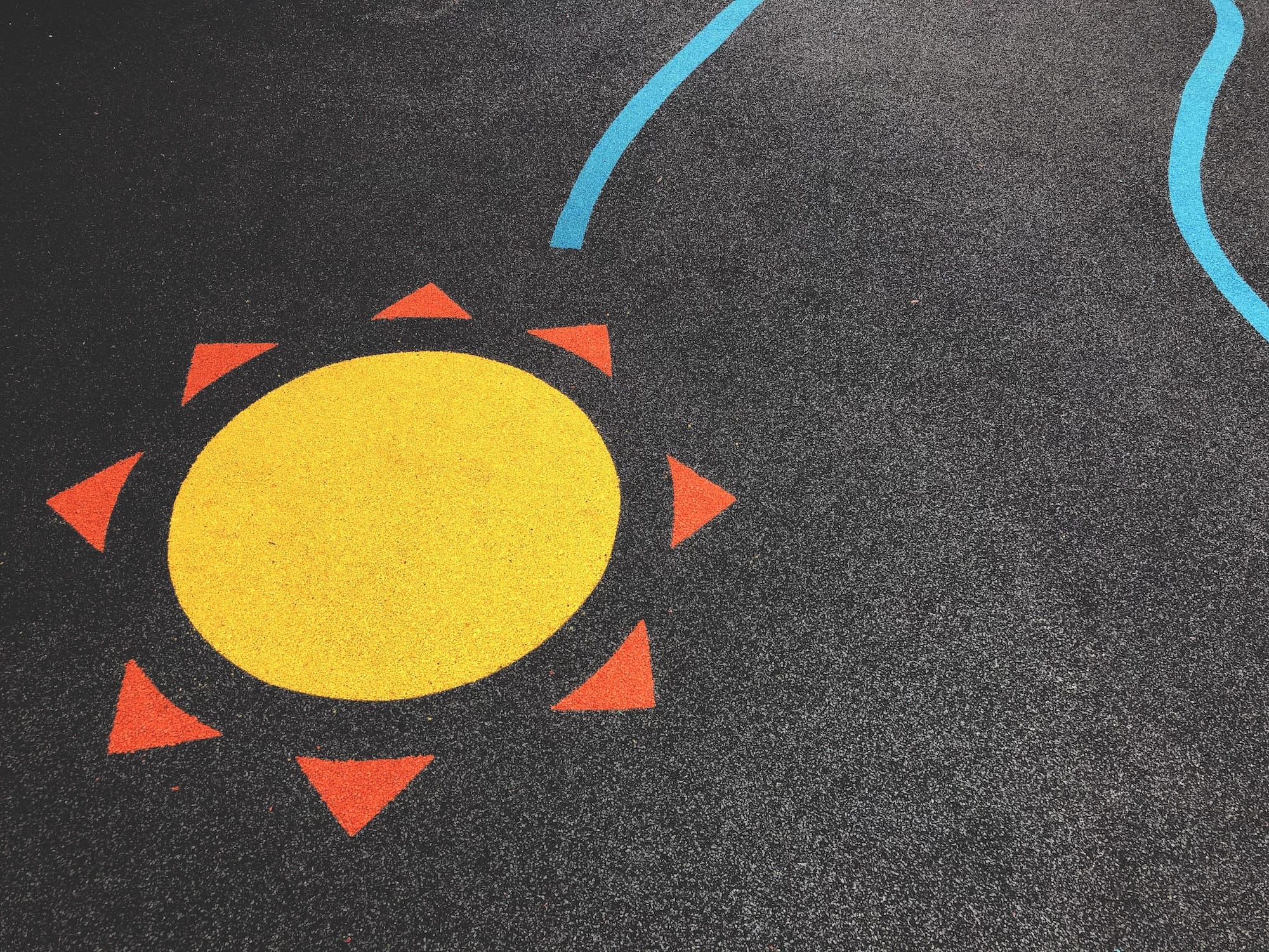 Sunshine painting on kid’s playground with copy space
